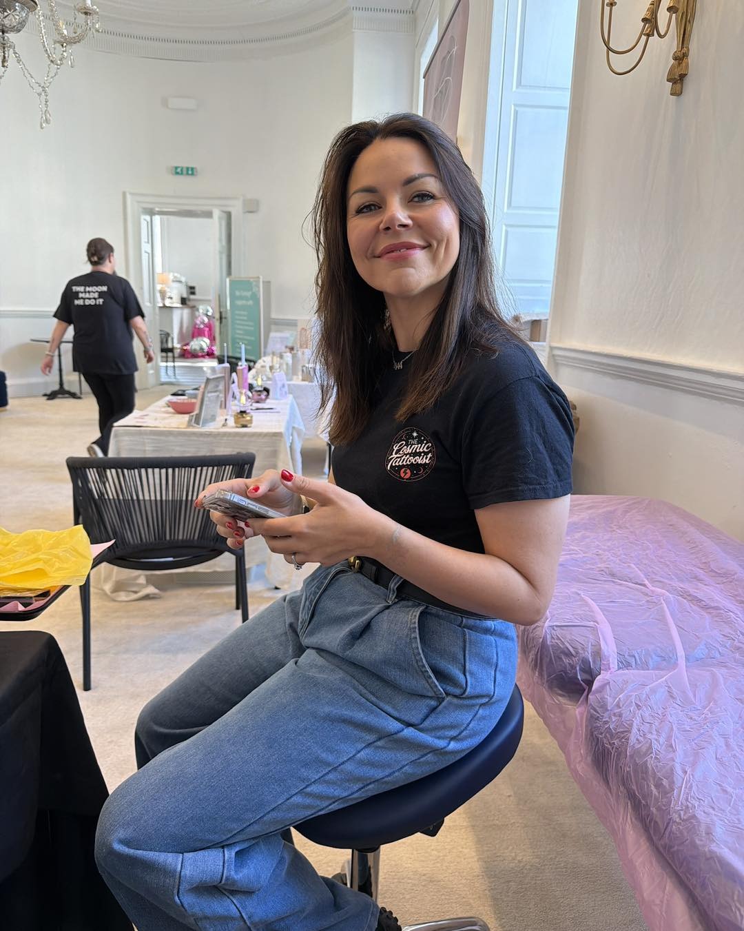 Laura at her tattoo station at an event
