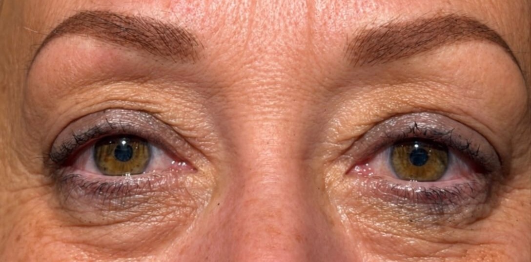 A client's brows after permanent makeup, natural shape and soft colour